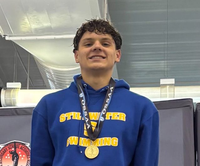 Senior Swimmer Breaks Multiple School Records